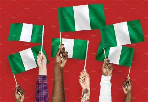 holding nigeria flag